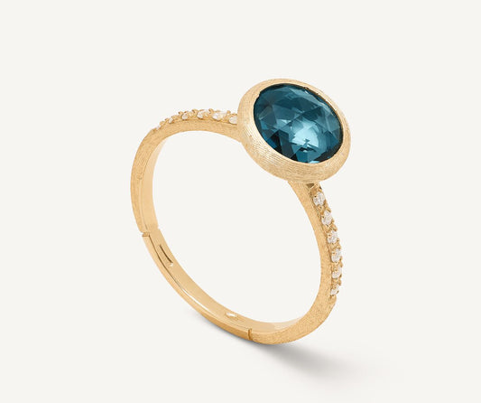18kt yellow gold ring with London blue Topaz and diamonds