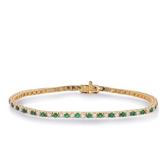 This Bracelet is available in 14K Yellow Gold. There are a total of 71 stones. There are Emerald with a total carat weight of 2.02 set in a Prong Set setting.There are Round stones with a total carat weight of 1.5 set in a Prong Set.