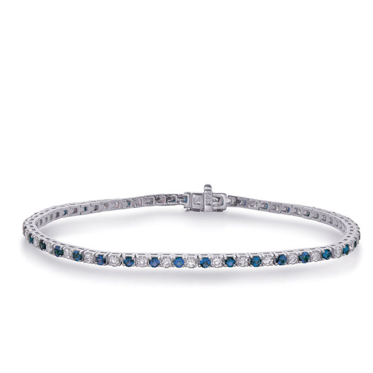 This Bracelet is available in 14K White Gold. There are a total of 71 stones. There are Round with a total carat weight of 1.5 set in a Prong Set setting.There are Sapphire stones with a total carat weight of 2.42 set in a Prong Set.