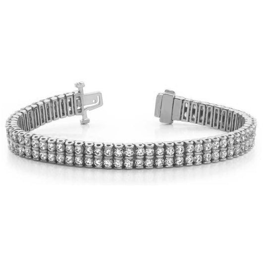 This Bracelet is available in 14K White Gold. There are a total of 126 stones. There are Round with a total carat weight of 4.81 set in a Channel Set setting.