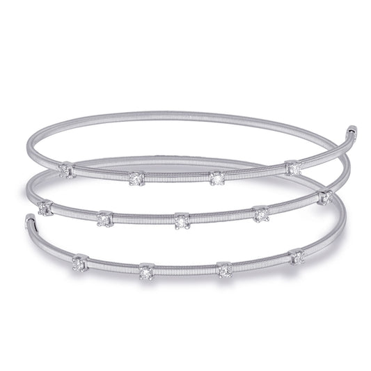 This Bracelet is available in 14K White Gold. There are a total of 13 stones. There are Round with a total carat weight of 0.55 set in a  setting.