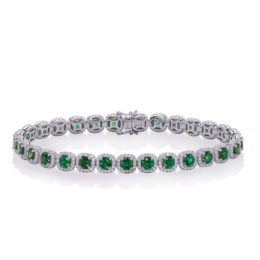 This Bracelet is available in 14K White Gold. There are a total of 495 stones. There are Emerald with a total carat weight of 4.91 set in a Micro Prong|Prong Set|Shared Prongs setting.There are Round stones with a total carat weight of 1.85 set in a Micro Prong|Prong Set|Shared Prongs.