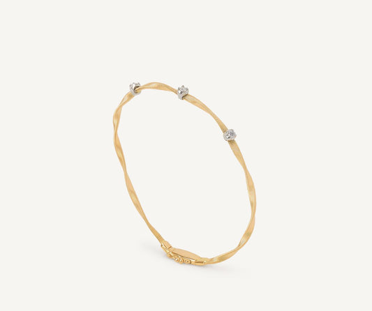 Diamond yellow gold bangle bracelet