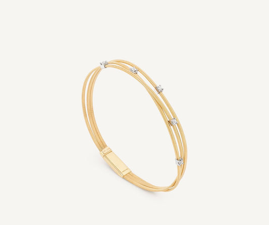 Multi-strand yellow gold diamond bracelet