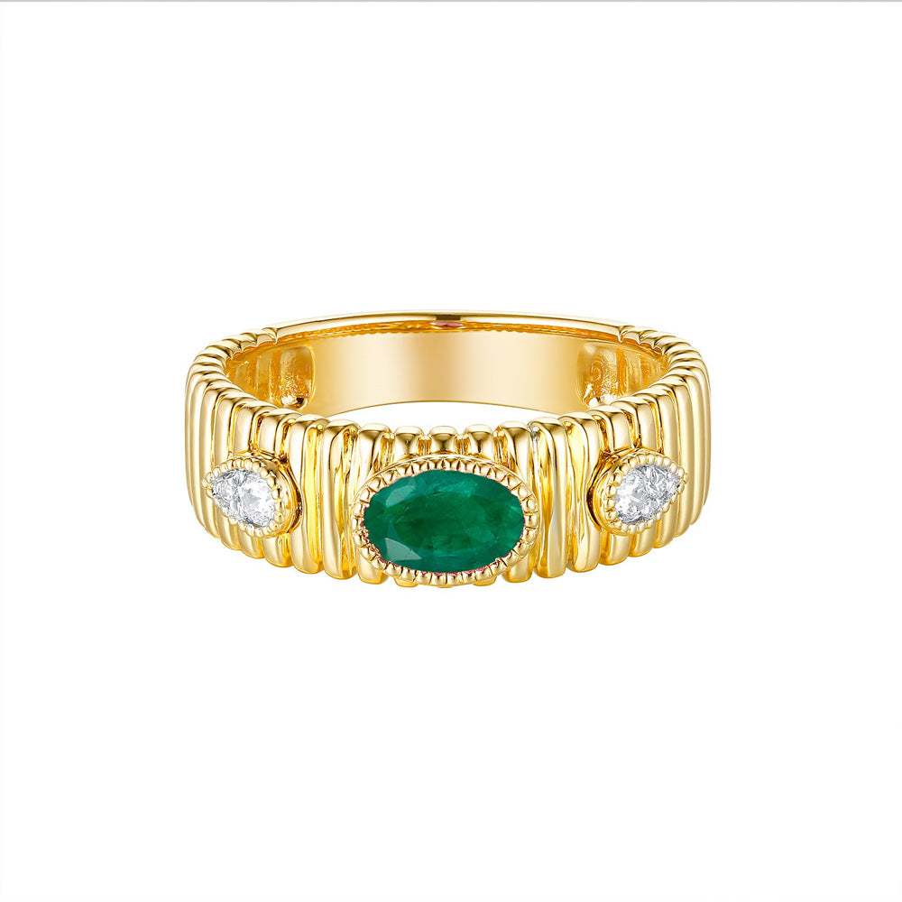 This Gem Stone Ring is available in 14K Yellow Gold. There are a total of 5 stones. There are Emerald with a total carat weight of 0.4 set in a Bezel Set|Micro Prong setting.There are Rounds stones with a total carat weight of 0.09 set in a Bezel Set|Micro Prong.