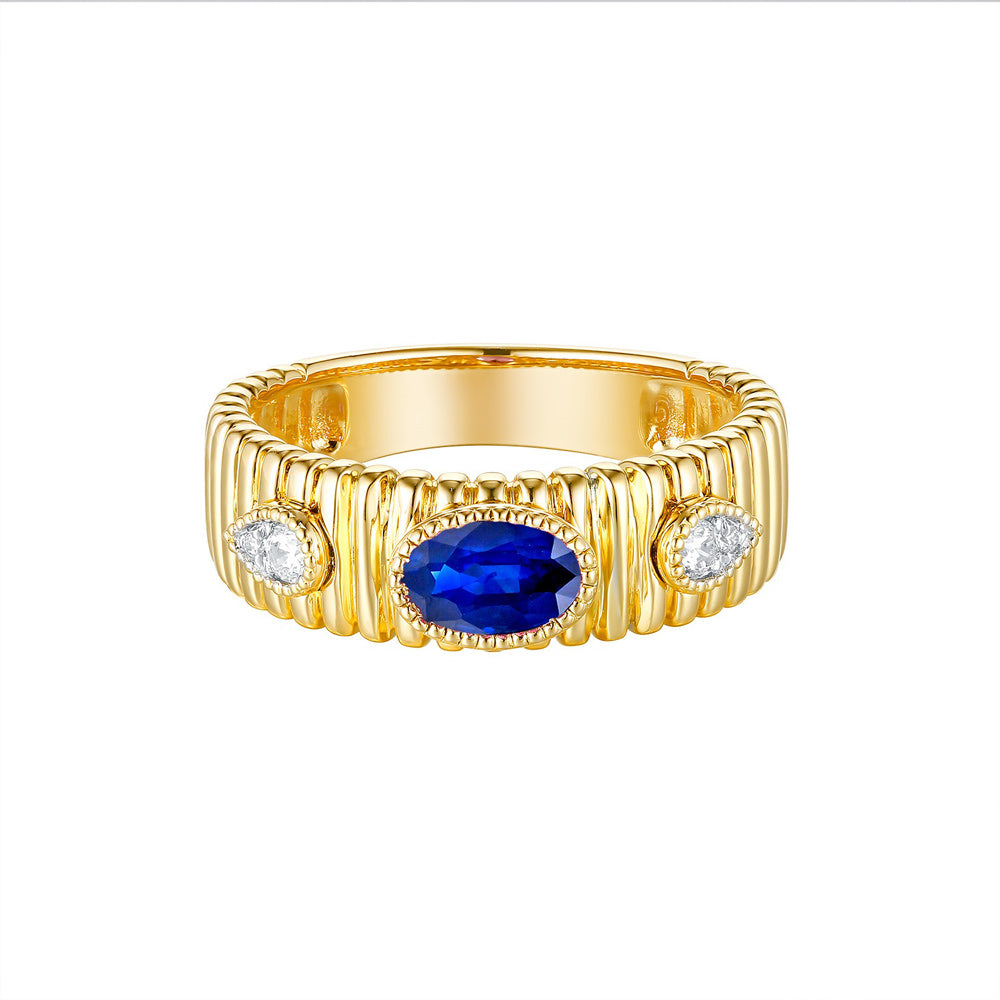 This Gem Stone Ring is available in 14K Yellow Gold. There are a total of 5 stones. There are Rounds with a total carat weight of 0.09 set in a Bezel Set|Micro Prong setting.There are Sapphire stones with a total carat weight of 0.55 set in a Bezel Set|Micro Prong.