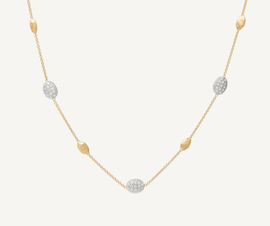 Gold necklace with oval elements and diamonds