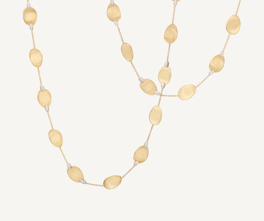 Long necklace with 18kt yellow gold leaves and diamond accents