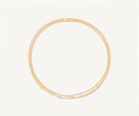 Multi-strand gold necklace with diamonds