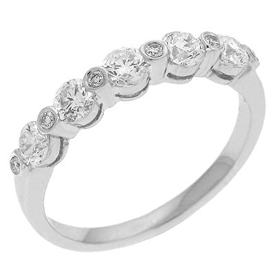This Band is available in 14K White Gold. There are a total of 11 stones. There are Round with a total carat weight of 0.68 set in a Bezel Set setting.