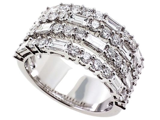 This Fashion Ring is available in 14K White Gold. There are a total of 50 stones. There are Baguette with a total carat weight of 1.18 set in a Prong Set setting.There are Rounds stones with a total carat weight of 1.27 set in a Prong Set.