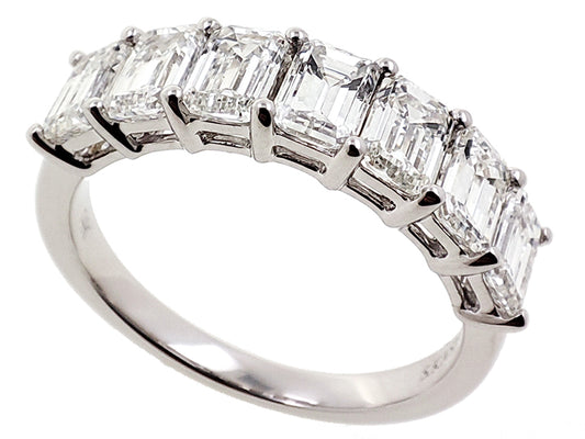 This Fashion Ring is available in 14K White Gold. There are a total of 7 stones. There are Emerald Cut with a total carat weight of 2.21 set in a Prong Set setting.