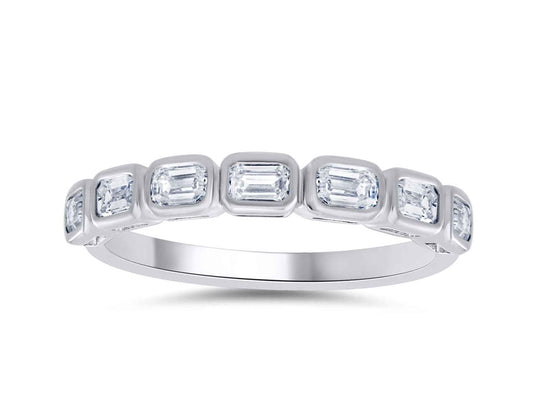 This Fashion Ring is available in 14K White Gold. There are a total of 7 stones. There are Emerald Cut with a total carat weight of 0.69 set in a Bezel Set setting.