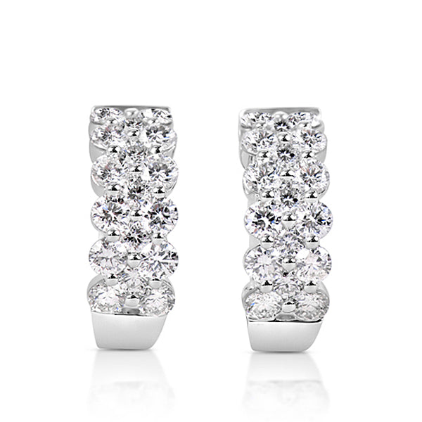 This Earring is available in 14K White Gold. There are a total of 34 stones. There are Rounds with a total carat weight of 1.8 set in a Shared Prongs setting.