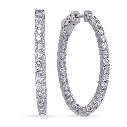 This Earring is available in 14K White Gold. There are a total of 54 stones. There are Rounds with a total carat weight of 2.21 set in a Prong Set setting.