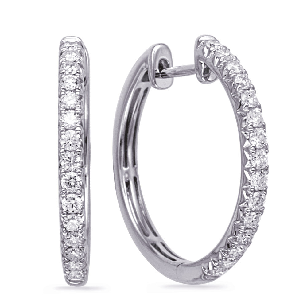 This Earring is available in 14K White Gold. There are a total of 30 stones. There are Rounds with a total carat weight of 0.59 set in a setting.