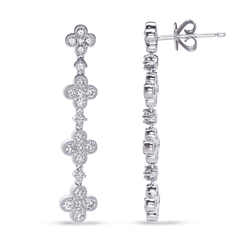 This Earring is available in 14K White Gold. There are a total of 46 stones. There are Rounds with a total carat weight of 0.86 set in a Bezel Set|Prong Set setting.