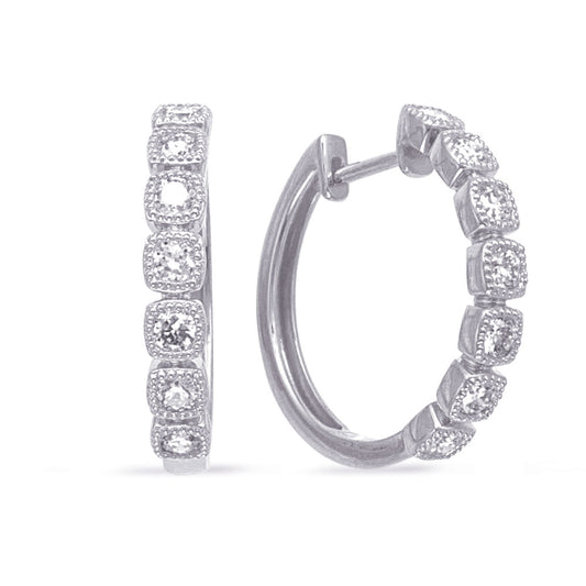 This Earring is available in 14K White Gold. There are a total of 14 stones. There are Rounds with a total carat weight of 0.65 set in a Micro Prong setting.