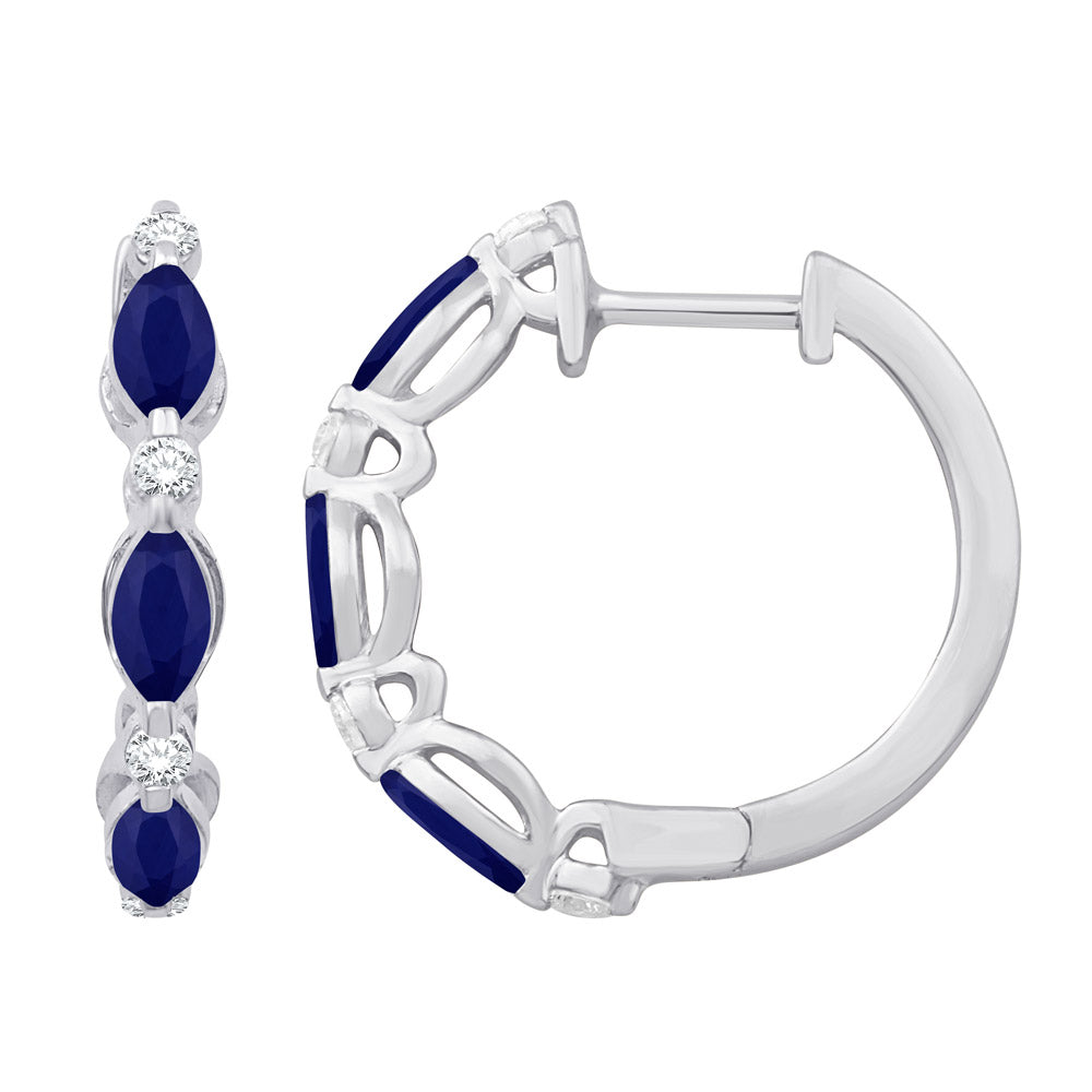 This Earring is available in 14K White Gold. There are a total of 14 stones. There are Rounds with a total carat weight of 0.14 set in a Prong Set setting.