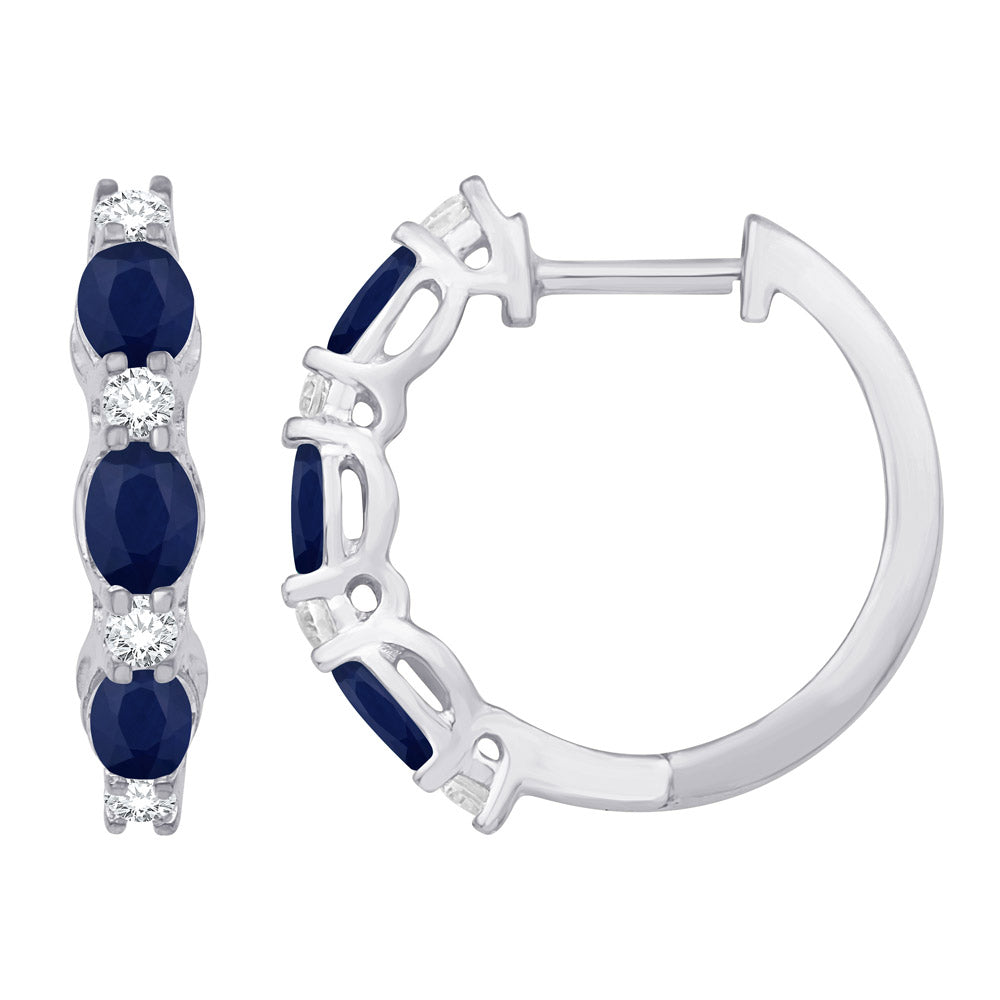 This Earring is available in 14K White Gold. There are a total of 14 stones. There are Rounds with a total carat weight of 0.22 set in a Micro Prong|Prong Set setting.There are Sapphire stones with a total carat weight of 1.17 set in a Micro Prong|Prong Set.