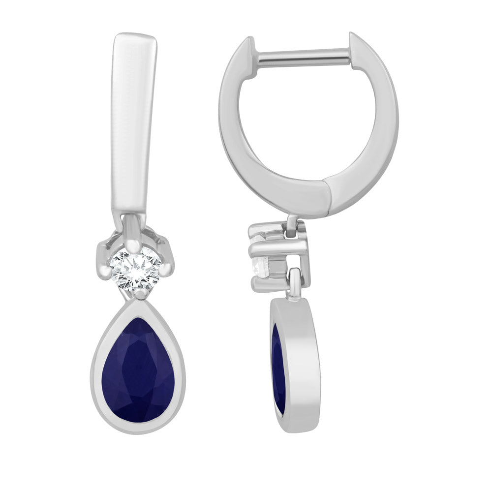 This Earring is available in 14K White Gold. There are a total of 4 stones. There are Rounds with a total carat weight of 0.15 set in a Bezel Set|Micro Prong setting.There are Sapphire stones with a total carat weight of 0.86 set in a Bezel Set|Micro Prong.