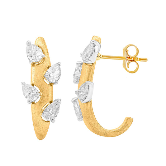 This Earring is available in 14K Yellow Gold. There are a total of 8 stones. There are Pear Shape with a total carat weight of 1 set in a Prong Set setting.