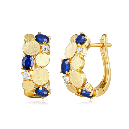 This Earring is available in 14K Yellow Gold. There are a total of 12 stones. There are Rounds with a total carat weight of 0.16 set in a Prong Set setting.There are Sapphire stones with a total carat weight of 1.31 set in a Prong Set.