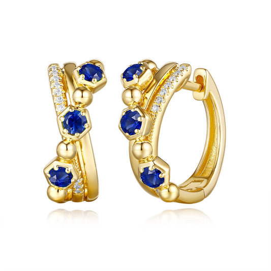 This Earring is available in 14K Yellow Gold. There are a total of 28 stones. There are Rounds with a total carat weight of 0.07 set in a Prong Set setting.There are Sapphire stones with a total carat weight of 0.54 set in a Prong Set.