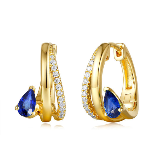 This Earring is available in 14K Yellow Gold. There are a total of 26 stones. There are Rounds with a total carat weight of 0.13 set in a Micro Prong setting.There are Sapphire stones with a total carat weight of 0.59 set in a Micro Prong.