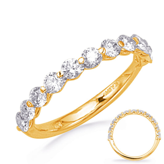 This Band is available in 14K Yellow Gold. There are a total of 11 stones. There are Round with a total carat weight of 1.01 set in a Shared Prongs setting.