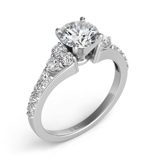This Engagement Ring is available in 14K White Gold. There are a total of 14 stones. There are Rounds with a total carat weight of 0.58 set in a setting.