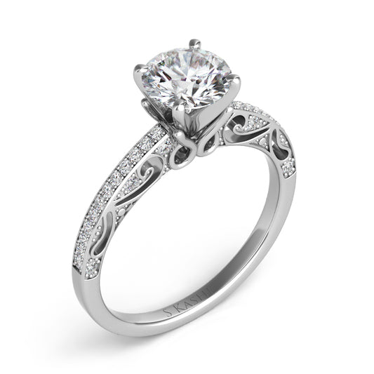 This Engagement Ring is available in 14K White Gold. There are a total of 36 stones. There are Rounds with a total carat weight of 0.2 set in a Micro Pave setting.