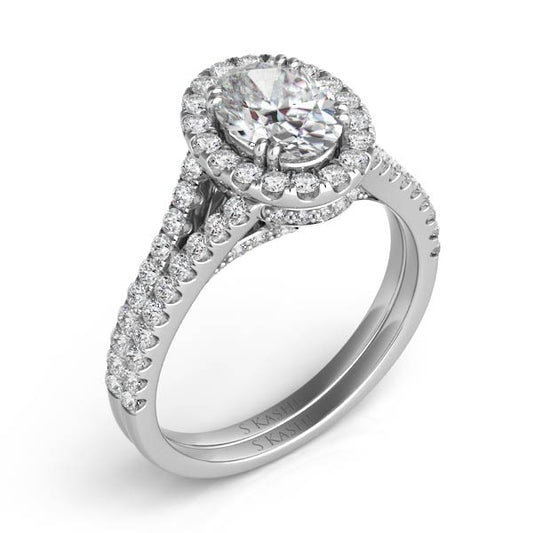 This Engagement Ring is available in 14K White Gold. There are a total of 86 stones. There are Rounds with a total carat weight of 0.7 set in a Micro Pave|Micro Prong setting.