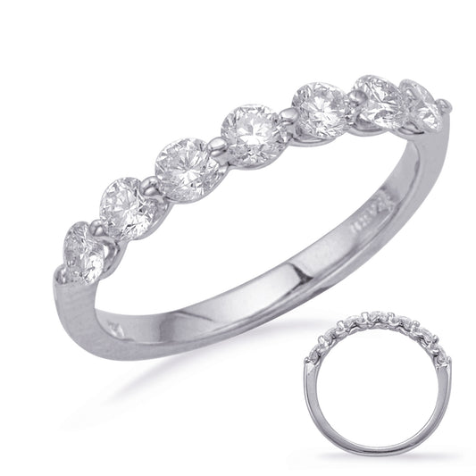 This Band is available in 14K White Gold. There are a total of 7 stones. There are Round with a total carat weight of 0.79 set in a Shared Prongs setting.