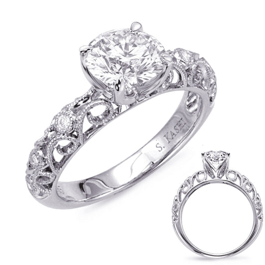 This Engagement Ring  is available in 14K White Gold. There are a total of 6 stones. There are Rounds with a total carat weight of 0.06 set in a Bezel Set setting.