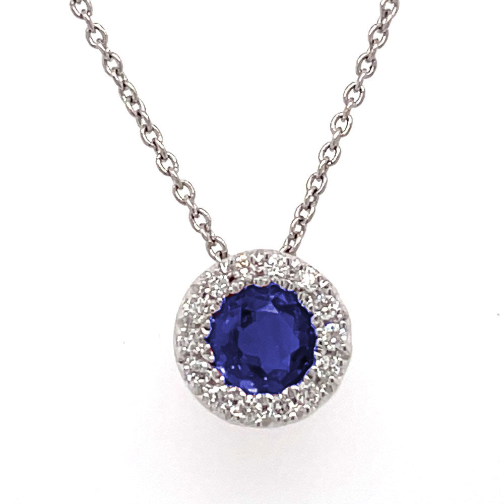 This Necklace is available in 14K White Gold. There are a total of 15 stones. There are Rounds with a total carat weight of 0.07 set in a setting.There are Sapphire stones with a total carat weight of 0.39 set in a .