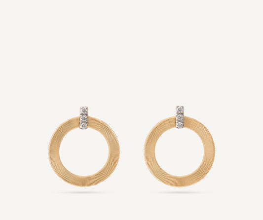 Gold stud earrings with diamonds