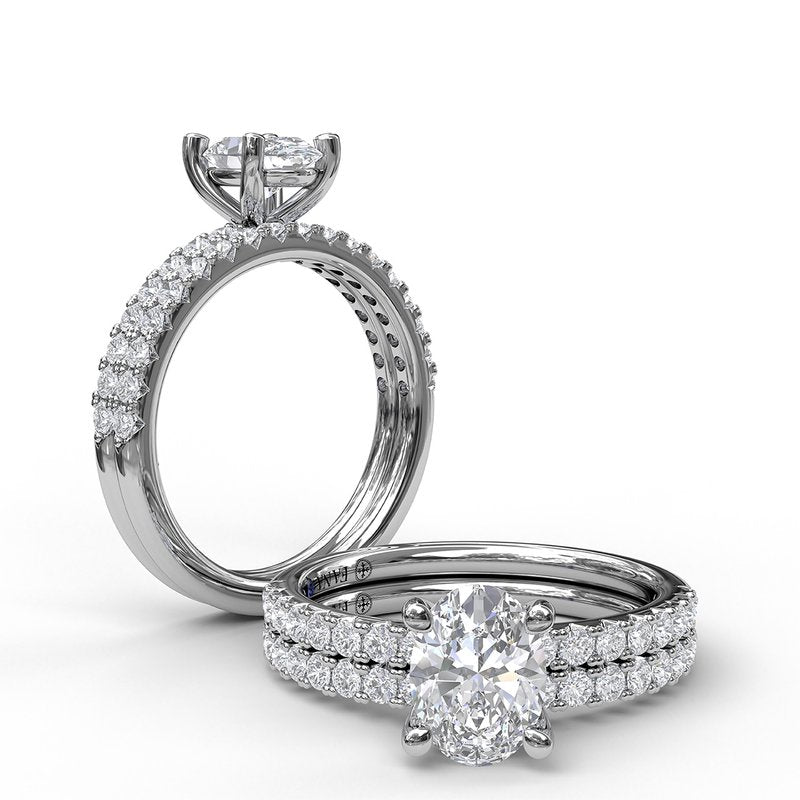Classic Single Row Engagement ring with an Oval Center Diamond. S3002 - TBird