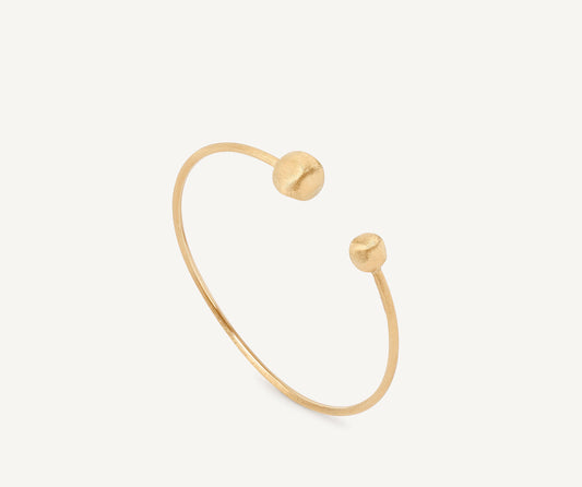 18kt yellow gold bangle with large beads