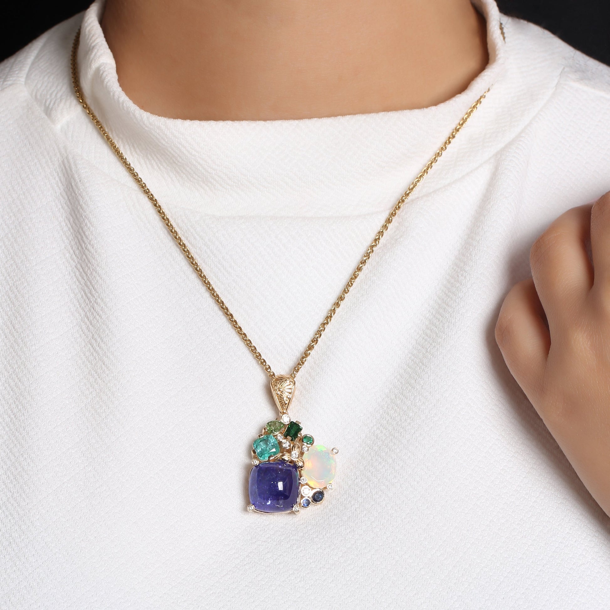 luxury-tanzanite-17-2ct-opal-2-75ct-emerald-1-3ct-blue-sapphire-tsavorite-chrome-diopide-and-diamond-0-20ct-pendant-in-18k-gold