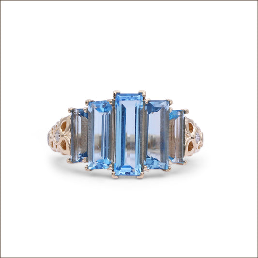 luxury-aurora-swiss-blue-topaz-and-0-15ct-diamond-ring-in-18k-gold