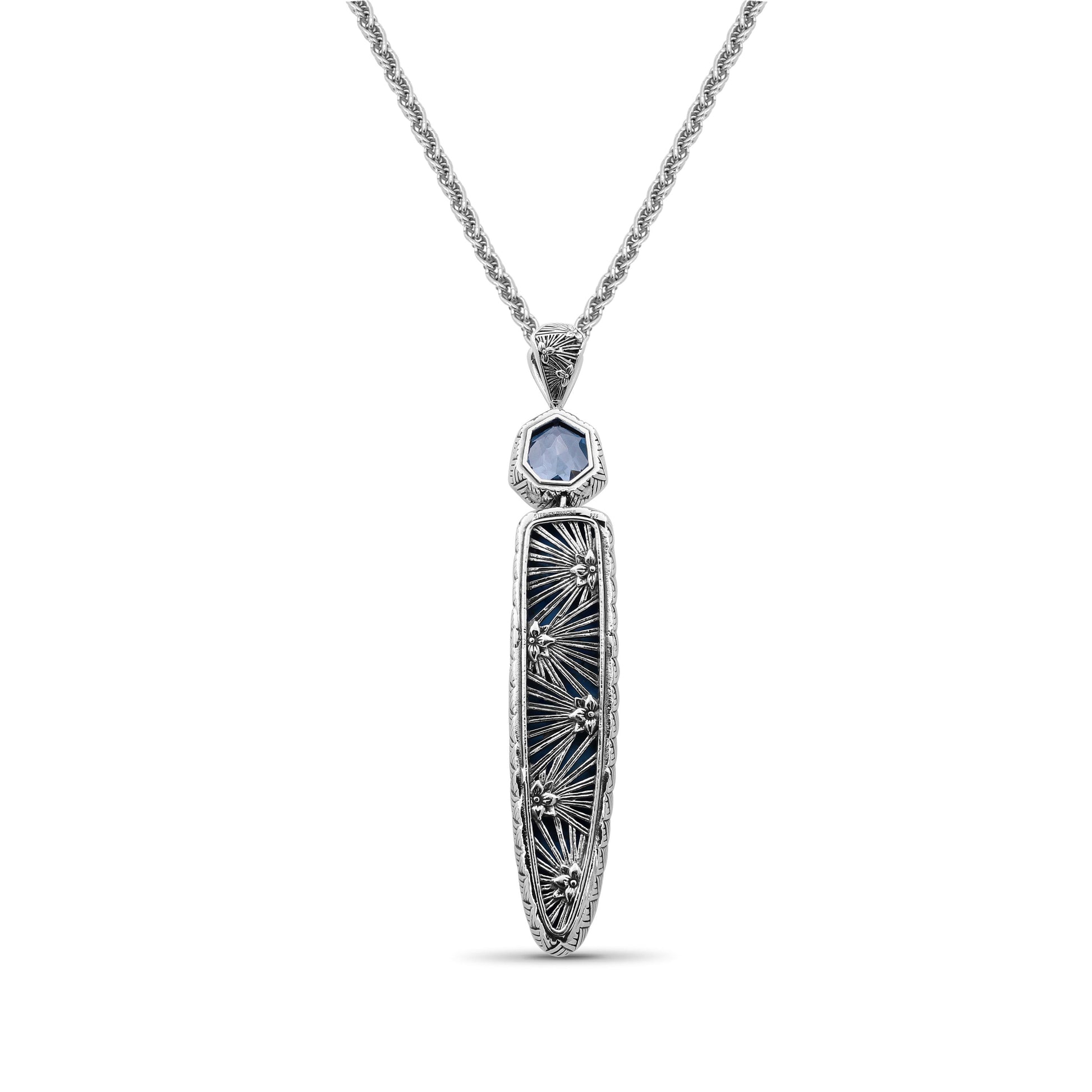 carventurous-hand-carved-turquoise-and-faceted-galactical-blue-topaz-pendant-in-sterling-silver