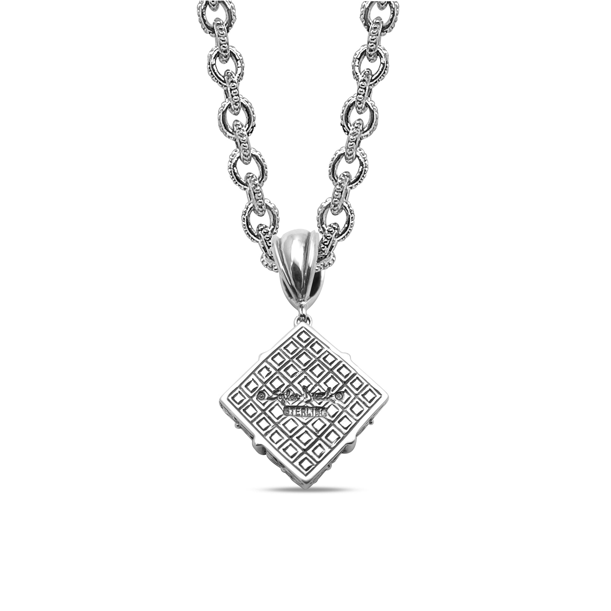 legacy-tahitian-mother-of-pearl-pendant-carving-with-0-25ct-natural-champagne-diamonds