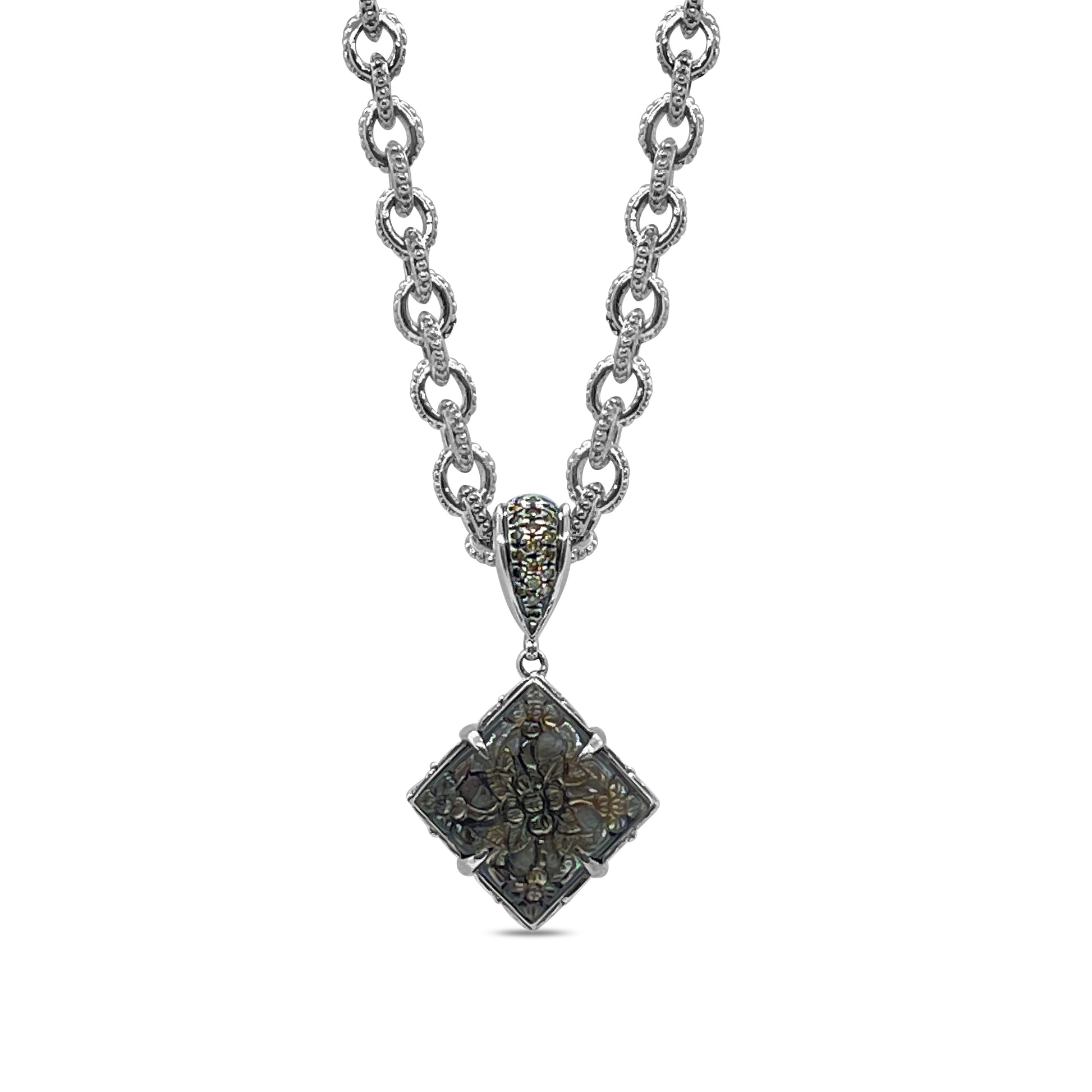 legacy-tahitian-mother-of-pearl-pendant-carving-with-0-25ct-natural-champagne-diamonds