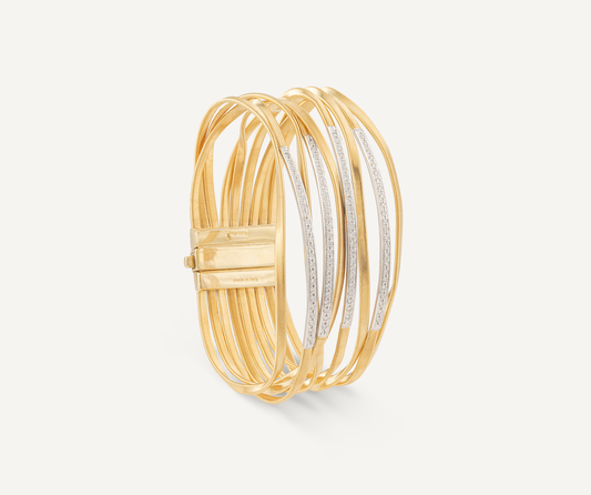 18kt yellow gold nine-strand bangle with diamond bars