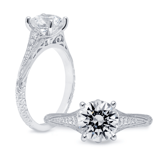 Peter Storm This elegant ring showcases a round center with a floral-inspired halo WSM372_4DiaW WSM372_4DiaW