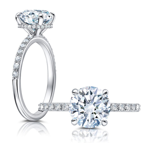 Peter Storm A classic, this hidden loop halo features larger diamonds on the shank WSM499_4DiaW WSM499_4DiaW