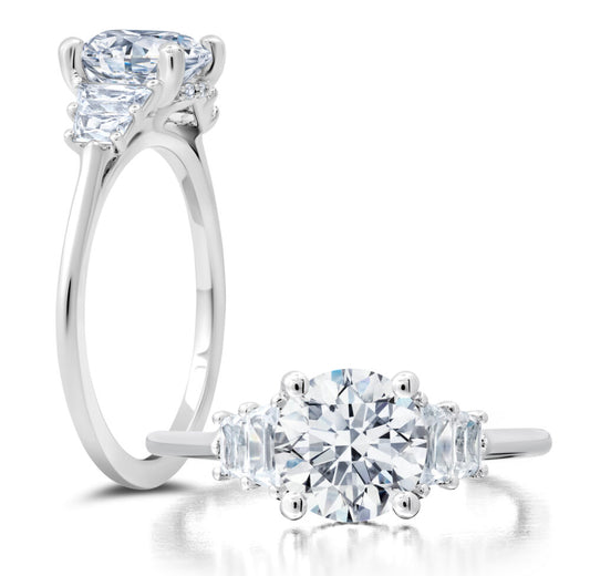 Peter Storm Peter adds a modern flair to this trapezoid three stone ring WSM547_4DiaW WSM547_4DiaW