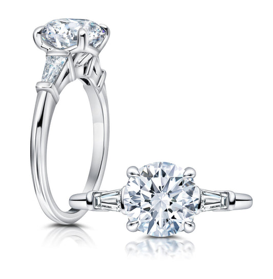 Peter Storm Peter adds a modern flair to this trapezoid three stone ring WSM609_4DiaW WSM609_4DiaW