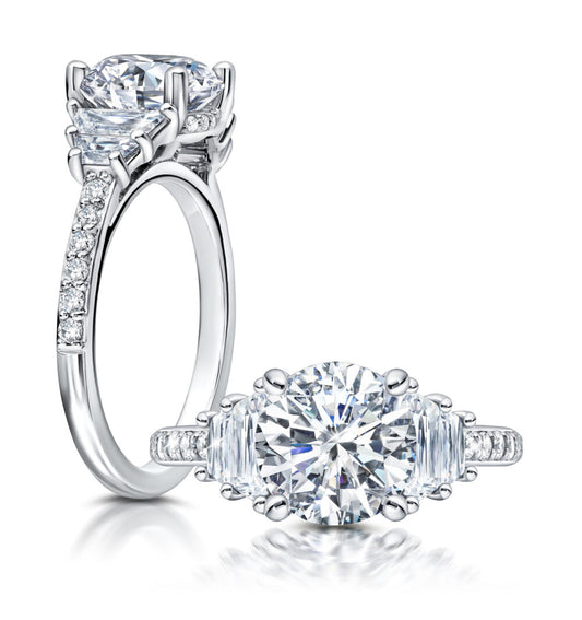 Peter Storm Peter adds a modern flair to this trapezoid three stone ring WSM646_4DiaW WSM646_4DiaW